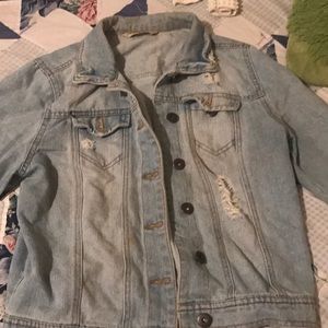 Distressed denim jacket